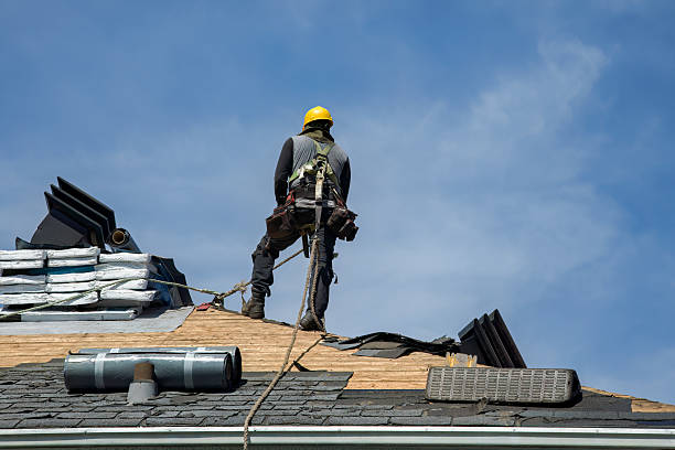 Professional Roofing technician working in Amityville, NY